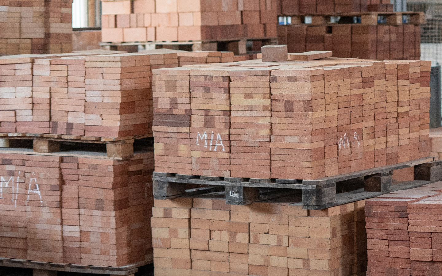 Stacked refractory fire bricks